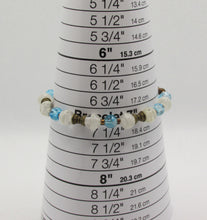 Load image into Gallery viewer, Translucent White and Blue Glass Bead Bracelet with Bronze Accents
