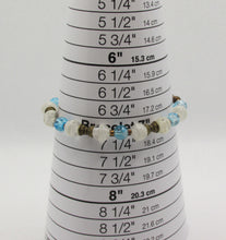 Load image into Gallery viewer, Translucent White and Blue Glass Bead Bracelet with Bronze Accents